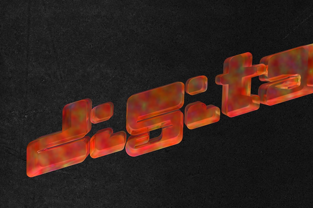 Diagonal orange, translucent, blocky 3D text spelling "digital" on a black background