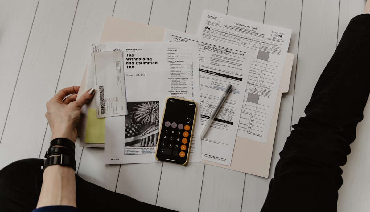 A bookkeeper working with AI-powered tools